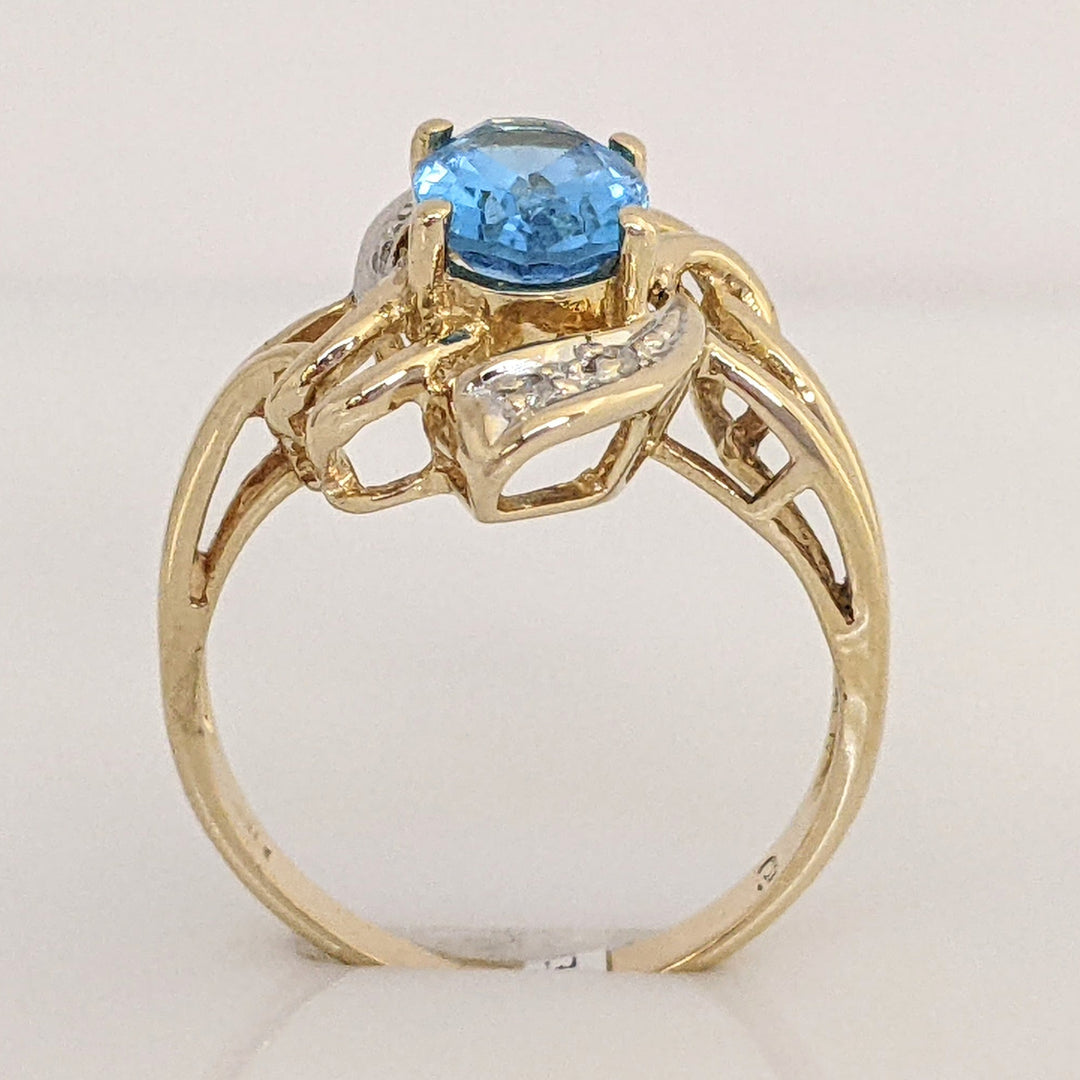 14K BLUE TOPAZ OVAL 6X8 WITH MELEE ESTATE TWIST-TOP RING 3.7 GRAMS