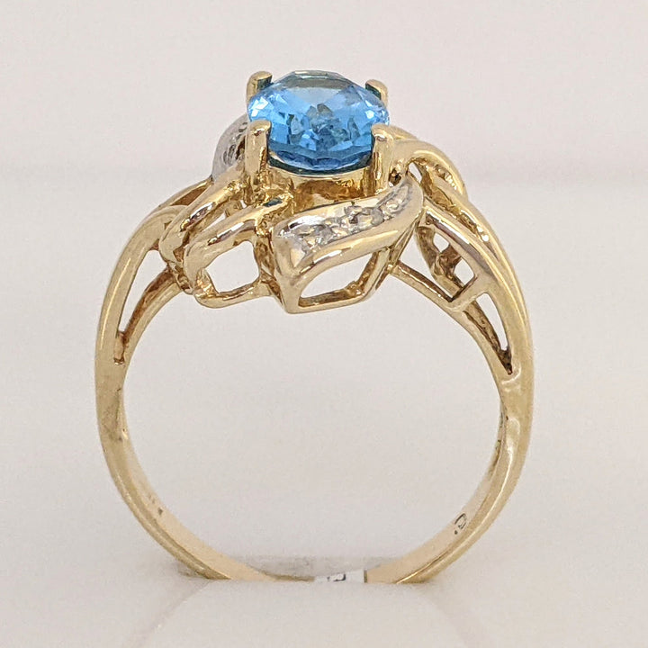 14K BLUE TOPAZ OVAL 6X8 WITH MELEE ESTATE TWIST-TOP RING 3.7 GRAMS