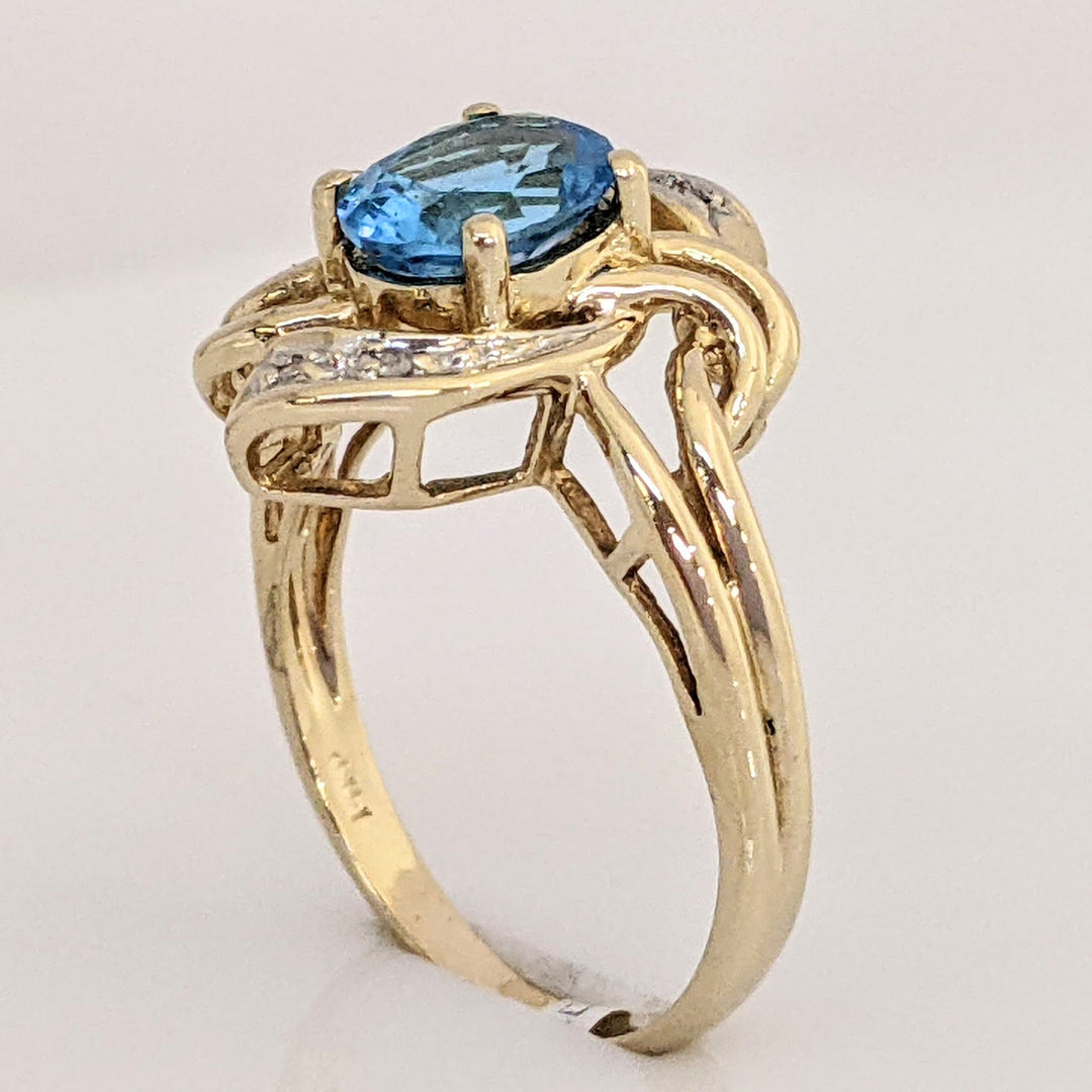 14K BLUE TOPAZ OVAL 6X8 WITH MELEE ESTATE TWIST-TOP RING 3.7 GRAMS