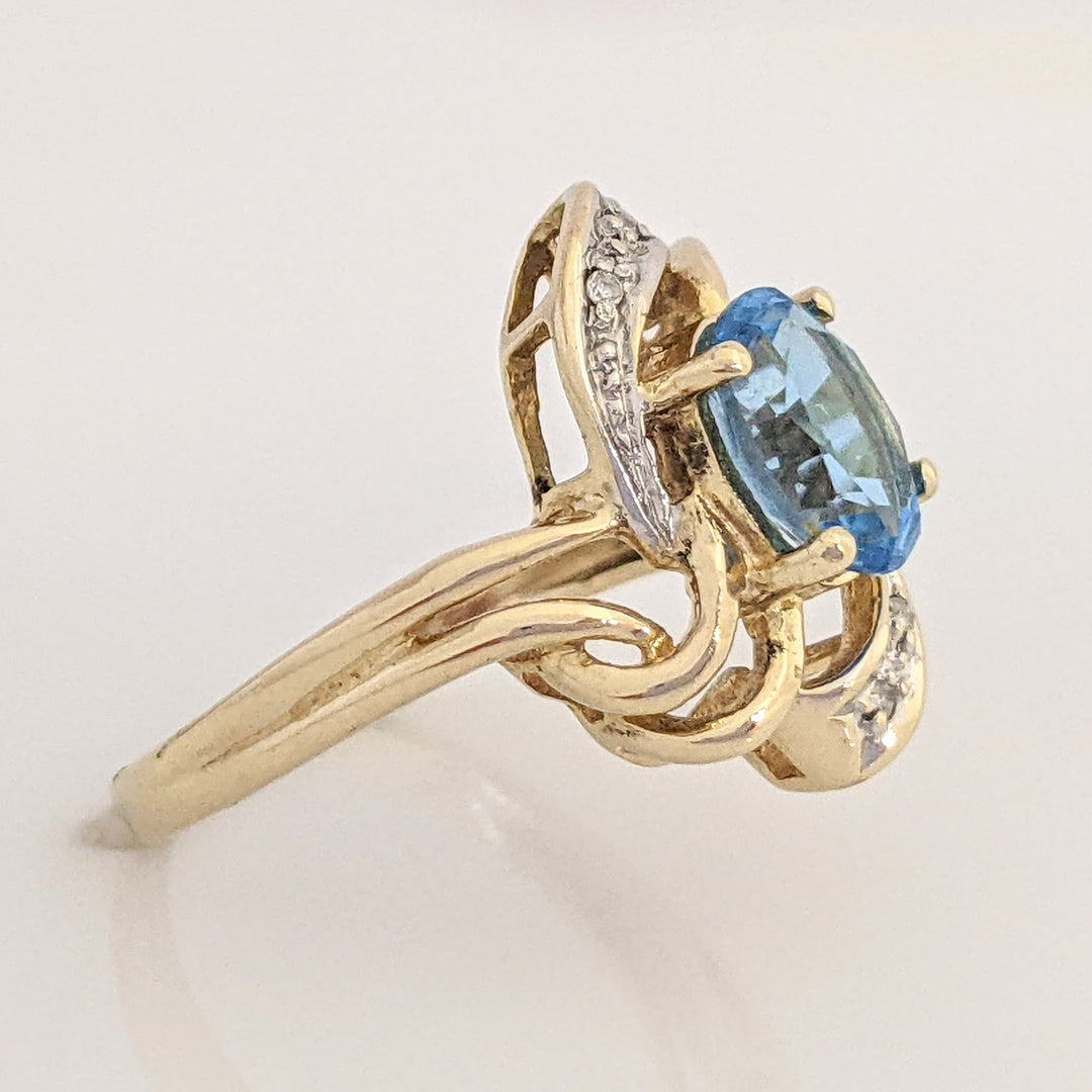 14K BLUE TOPAZ OVAL 6X8 WITH MELEE ESTATE TWIST-TOP RING 3.7 GRAMS