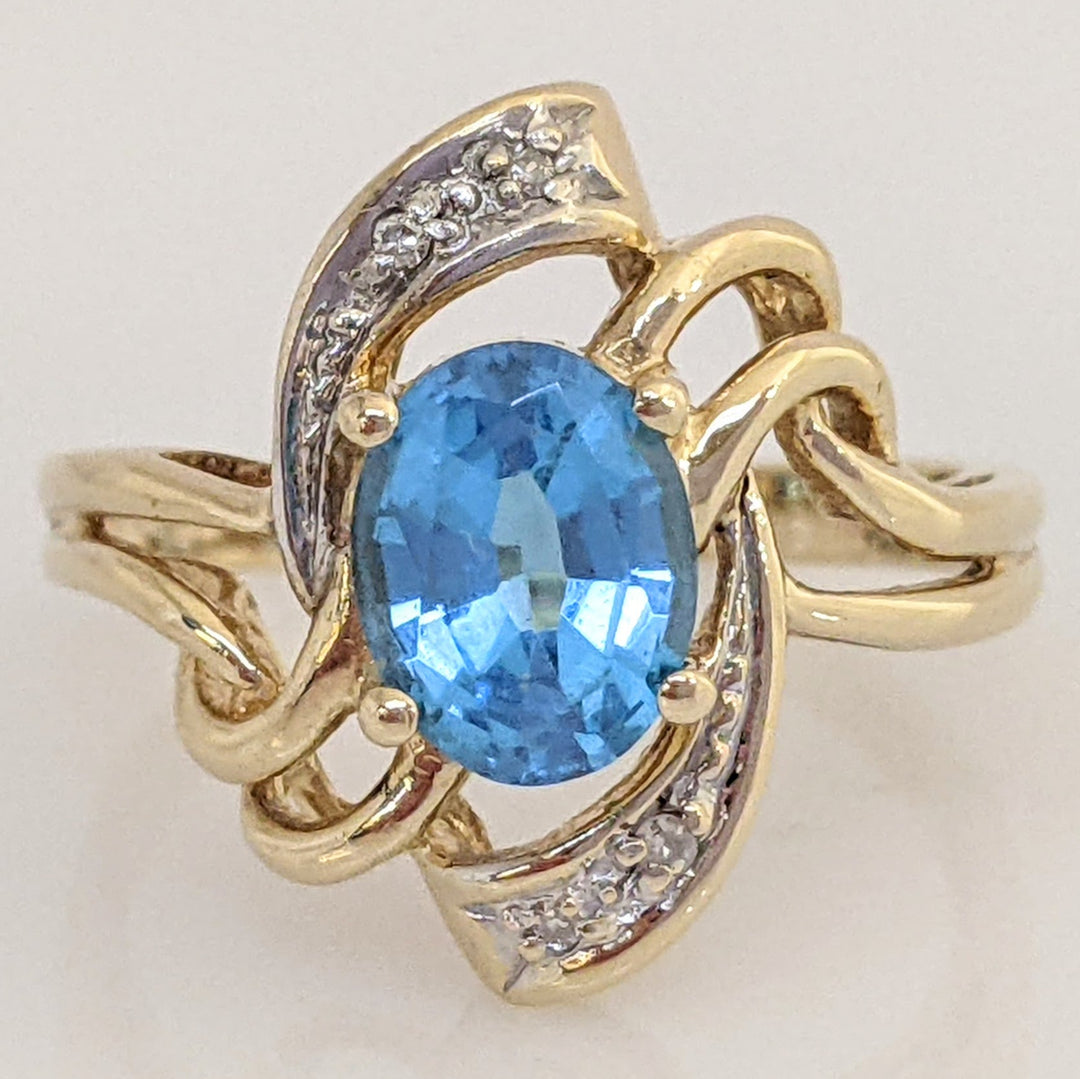 14K BLUE TOPAZ OVAL 6X8 WITH MELEE ESTATE TWIST-TOP RING 3.7 GRAMS