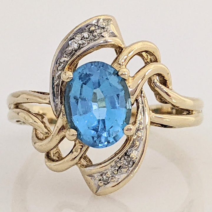 14K BLUE TOPAZ OVAL 6X8 WITH MELEE ESTATE TWIST-TOP RING 3.7 GRAMS
