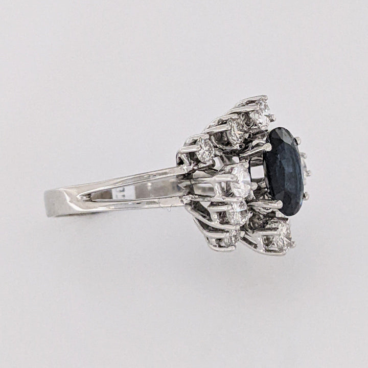 18K WHITE SAPPHIRE OVAL 6X8 WITH .76 DIAMOND TOTAL WEIGHT (12) ROUND ESTATE CLUSTER RING 4.0 GRAMS