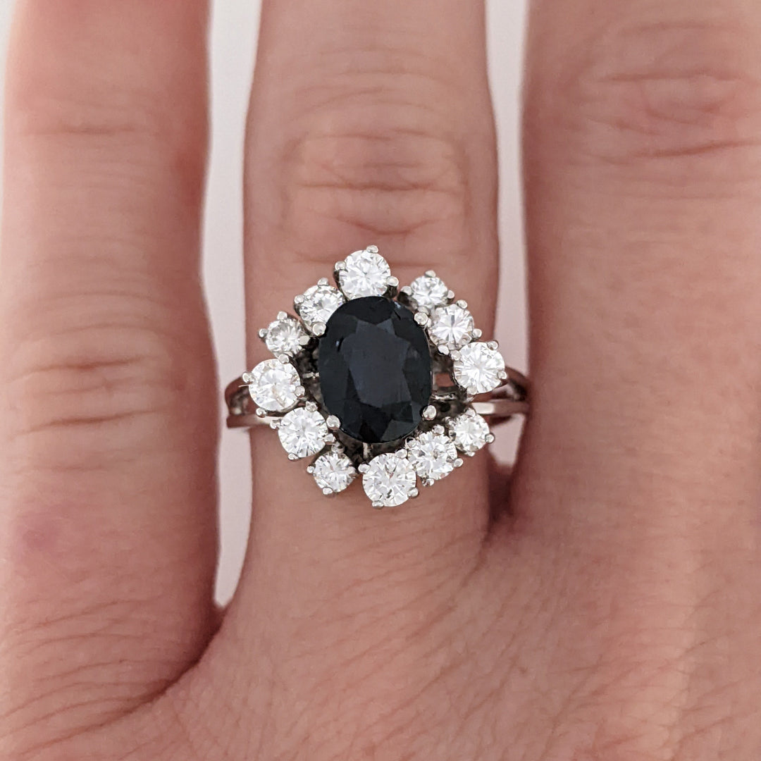 18K WHITE SAPPHIRE OVAL 6X8 WITH .76 DIAMOND TOTAL WEIGHT (12) ROUND ESTATE CLUSTER RING 4.0 GRAMS