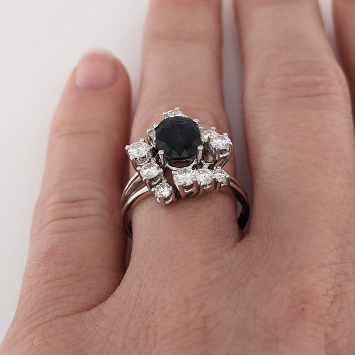 18K WHITE SAPPHIRE OVAL 6X8 WITH .76 DIAMOND TOTAL WEIGHT (12) ROUND ESTATE CLUSTER RING 4.0 GRAMS