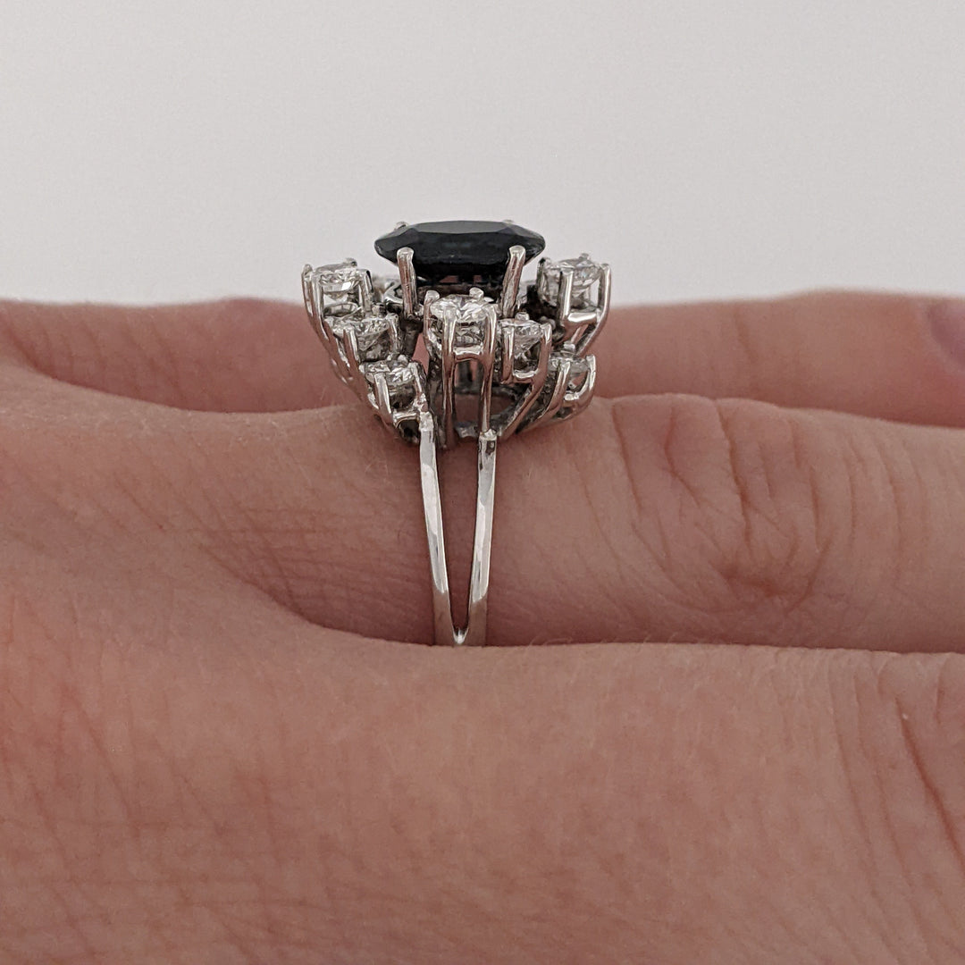 18K WHITE SAPPHIRE OVAL 6X8 WITH .76 DIAMOND TOTAL WEIGHT (12) ROUND ESTATE CLUSTER RING 4.0 GRAMS