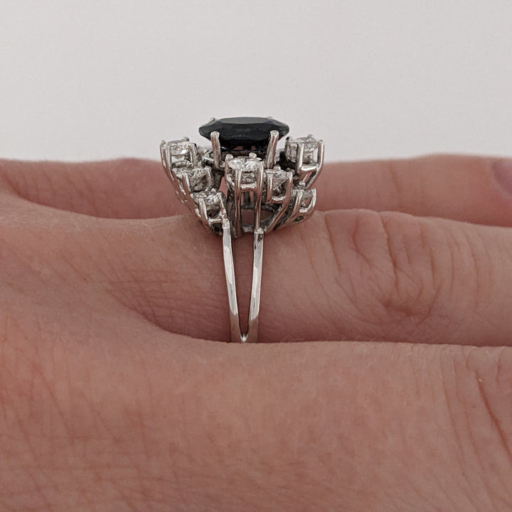18K WHITE SAPPHIRE OVAL 6X8 WITH .76 DIAMOND TOTAL WEIGHT (12) ROUND ESTATE CLUSTER RING 4.0 GRAMS