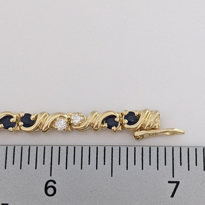 14K SAPPHIRE ROUND (16) 2.5MM WITH .48 DIAMOND TOTAL WEIGHT (16) ROUND ESTATE BRACELET 12.3 GRAMS