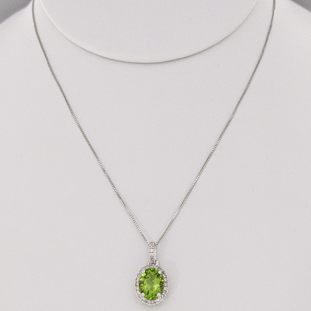 14K WHITE PERIDOT OVAL 7X9 WITH MELEE ESTATE HALO PENDANT & CHAIN 2.6 GRAMS
