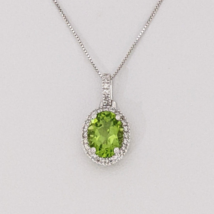14K WHITE PERIDOT OVAL 7X9 WITH MELEE ESTATE HALO PENDANT & CHAIN 2.6 GRAMS