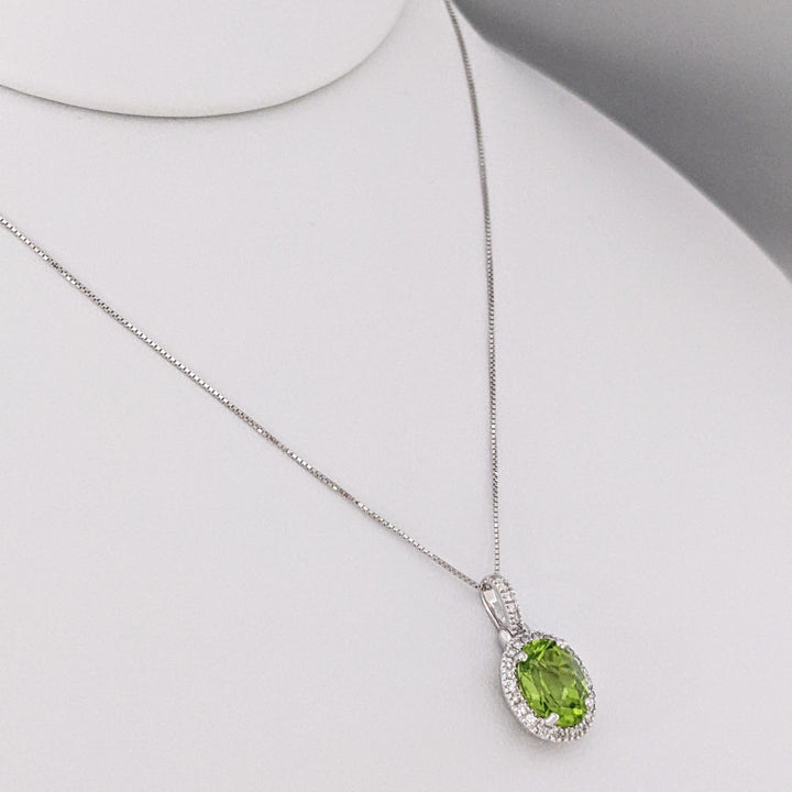 14K WHITE PERIDOT OVAL 7X9 WITH MELEE ESTATE HALO PENDANT & CHAIN 2.6 GRAMS