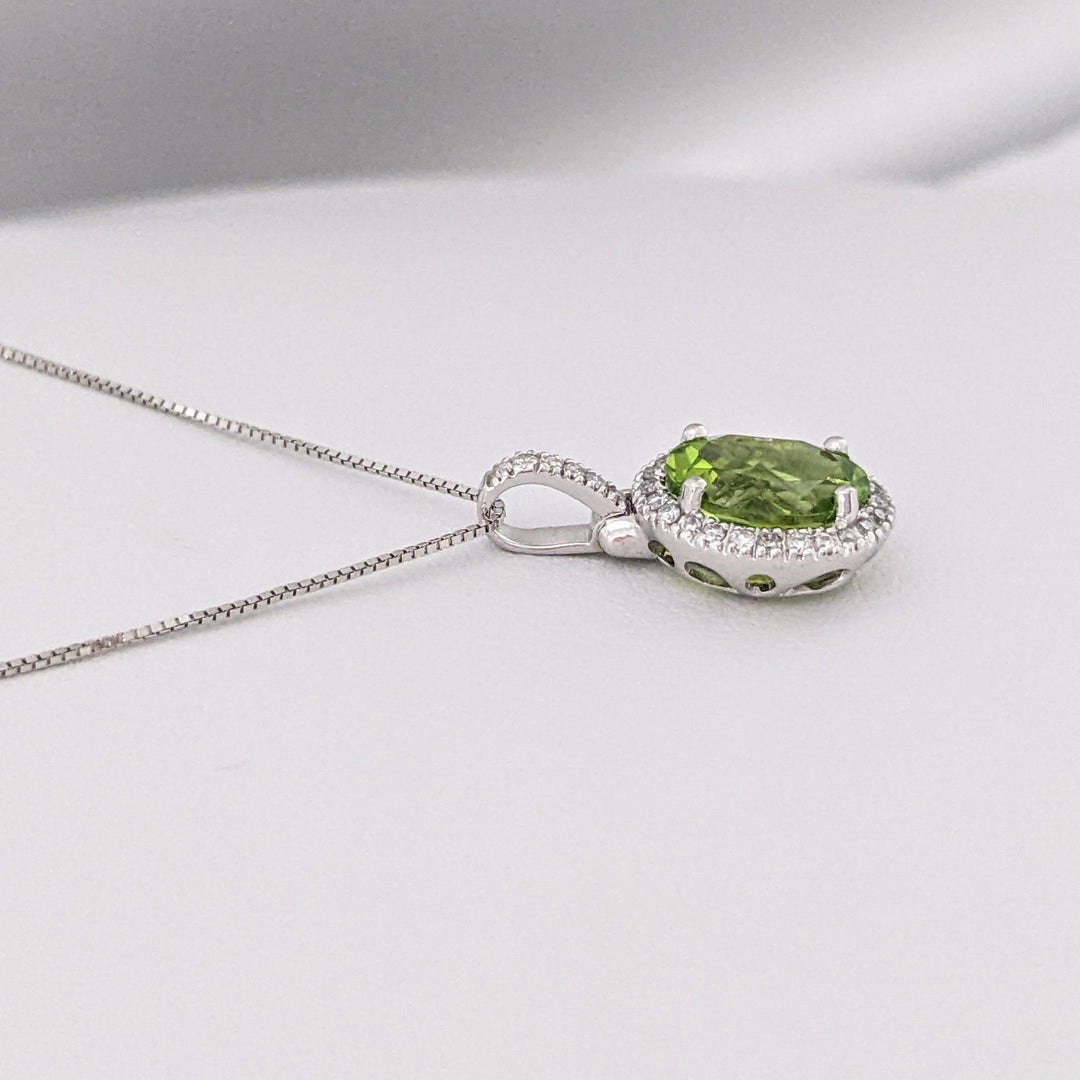 14K WHITE PERIDOT OVAL 7X9 WITH MELEE ESTATE HALO PENDANT & CHAIN 2.6 GRAMS
