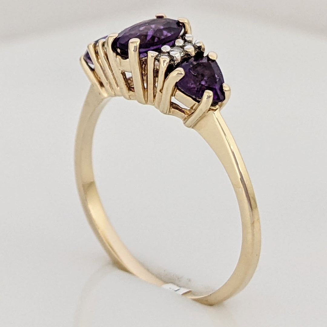 10K AMETHYST OVAL 4X6 WITH (2) TRILLION 4MM WITH (6) MELEE ESTATE RING 1.9 GRAMS