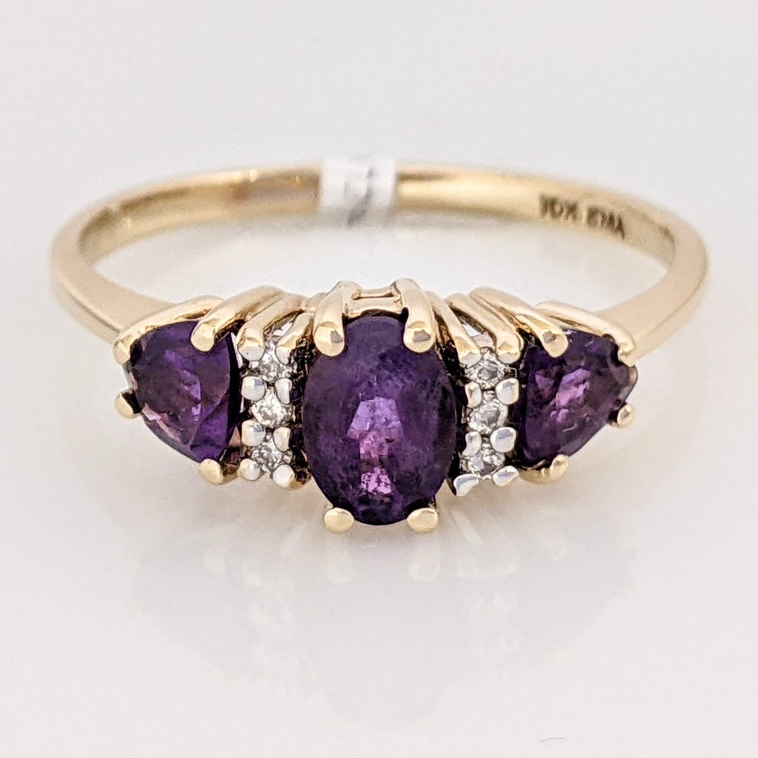 10K AMETHYST OVAL 4X6 WITH (2) TRILLION 4MM WITH (6) MELEE ESTATE RING 1.9 GRAMS
