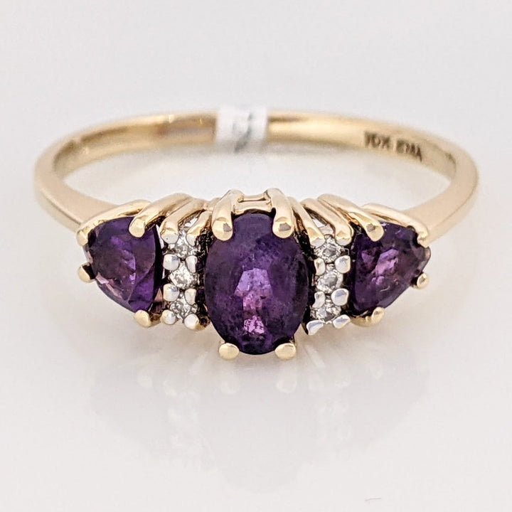10K AMETHYST OVAL 4X6 WITH (2) TRILLION 4MM WITH (6) MELEE ESTATE RING 1.9 GRAMS