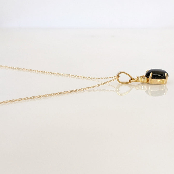 14K BLACK STAR SAPPHIRE OVAL 7X9 WITH (3) MELEE ESTATE PENDANT & CHAIN 2.1 GRAMS