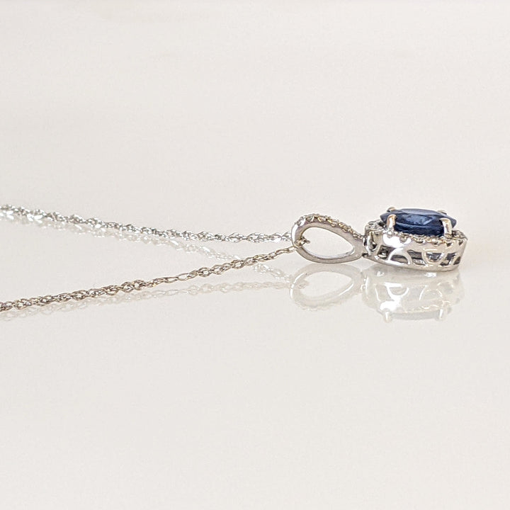 14K WHITE SAPPHIRE OVAL 5X7 WITH .13 DIAMOND TOTAL WEIGHT (26) ROUND ESTATE PENDANT & CHAIN 1.6 GRAMS