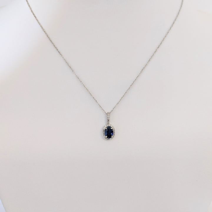 14K WHITE SAPPHIRE OVAL 5X7 WITH .13 DIAMOND TOTAL WEIGHT (26) ROUND ESTATE PENDANT & CHAIN 1.6 GRAMS