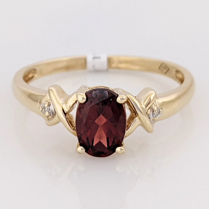 10K GARNET OVAL 5X7 WITH (2) MELEE ESTATE RING 1.8 GRAMS