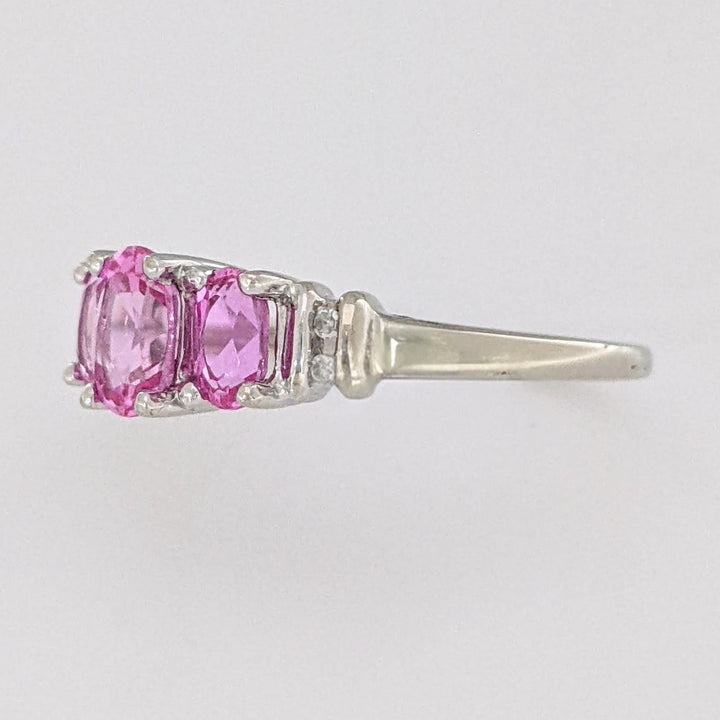 10K WHITE LAB-CREATED PINK SAPPHIRE OVAL 4X6 WITH (2) 3X5 AND (4) MELEE ESTATE RING 2.1 GRAMS