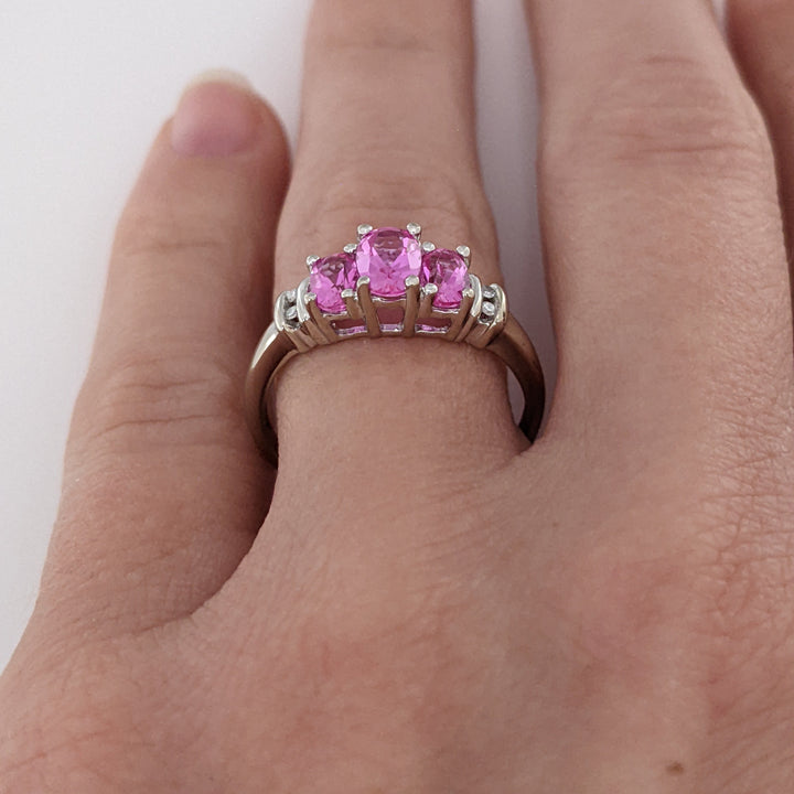 10K WHITE LAB-CREATED PINK SAPPHIRE OVAL 4X6 WITH (2) 3X5 AND (4) MELEE ESTATE RING 2.1 GRAMS