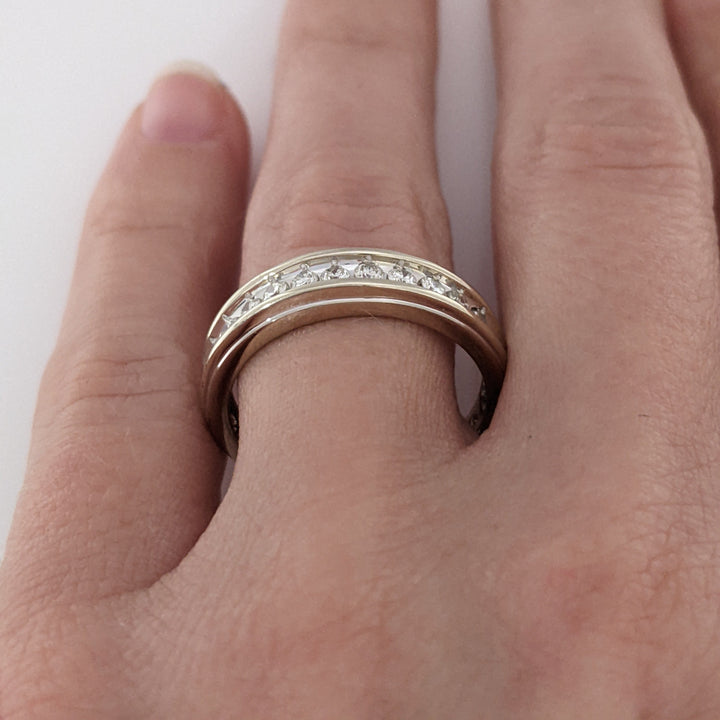 14K WHITE .33 CARAT TOTAL WEIGHT I1 H DIAMOND ROUND (11) ESTATE CHANNEL SET BAND 3.7 GRAMS