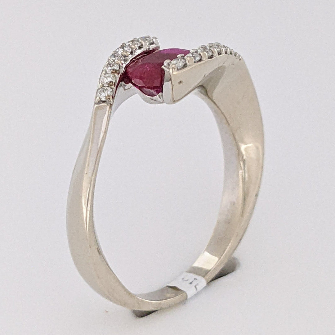 14K WHITE CLARITY ENHANCED RUBY OVAL 4X7 WITH .14 DIAMOND TOTAL WEIGHT ESTATE RING 4.7 GRAMS