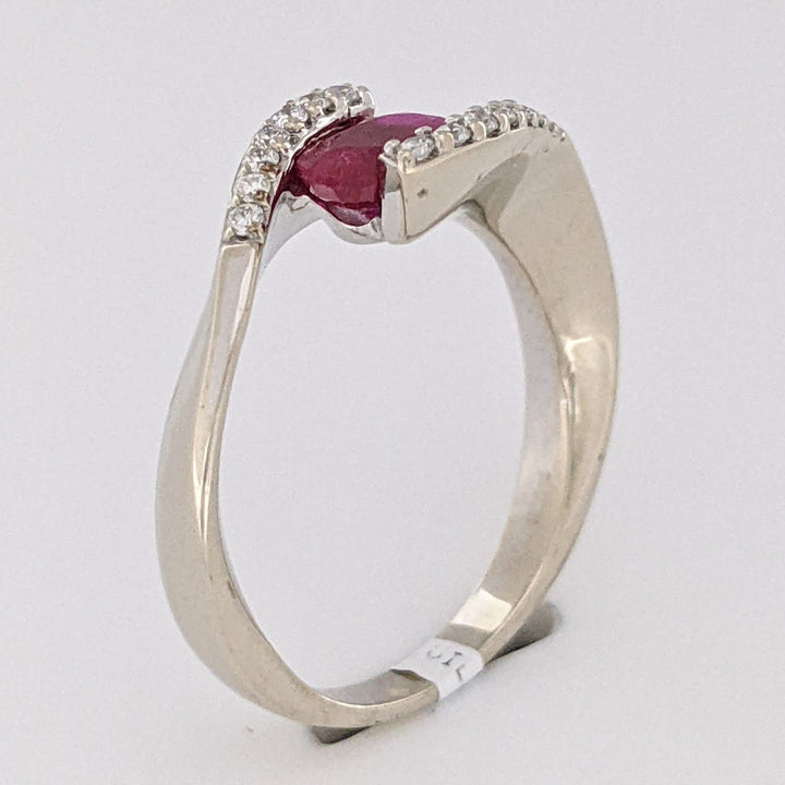 14K WHITE CLARITY ENHANCED RUBY OVAL 4X7 WITH .14 DIAMOND TOTAL WEIGHT ESTATE RING 4.7 GRAMS