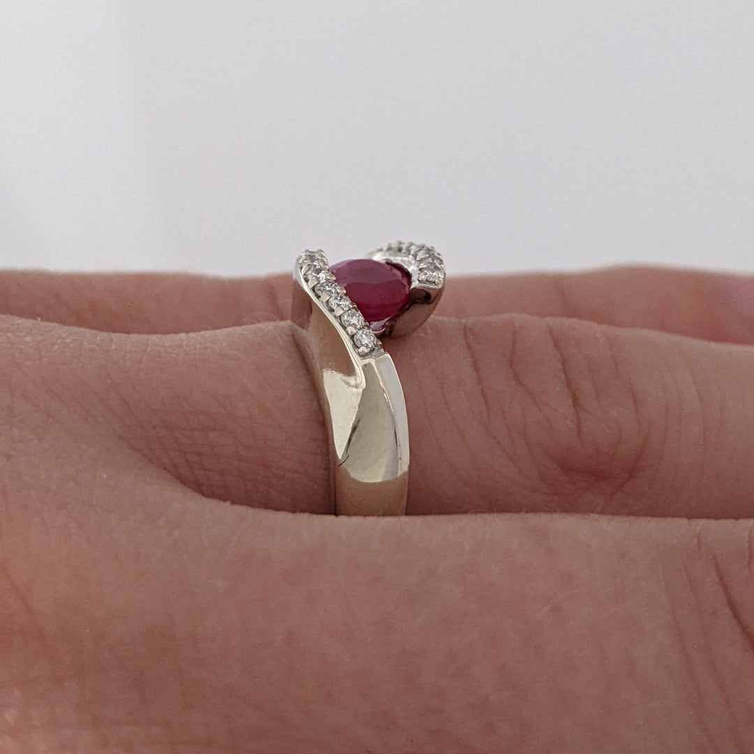 14K WHITE CLARITY ENHANCED RUBY OVAL 4X7 WITH .14 DIAMOND TOTAL WEIGHT ESTATE RING 4.7 GRAMS