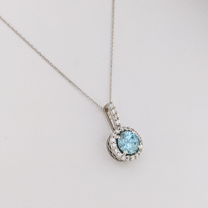 14K WHITE BLUE TOPAZ ROUND 6MM WITH .22 DIAMOND TOTAL WEIGHT ESTATE HALO PENDANT & CHAIN 2.1 GRAMS