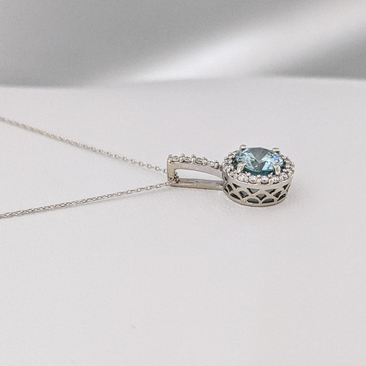 14K WHITE BLUE TOPAZ ROUND 6MM WITH .22 DIAMOND TOTAL WEIGHT ESTATE HALO PENDANT & CHAIN 2.1 GRAMS