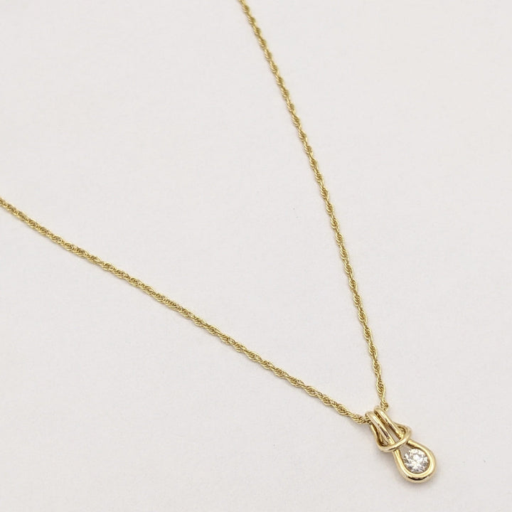 14K .16 CARAT TOTAL VS1 I DIAMOND ROUND LOVE KNOT ESTATE PENDANT & CHAIN 2.1 GRAMS