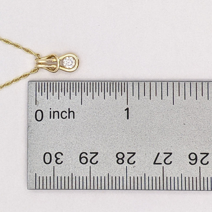 14K .16 CARAT TOTAL VS1 I DIAMOND ROUND LOVE KNOT ESTATE PENDANT & CHAIN 2.1 GRAMS