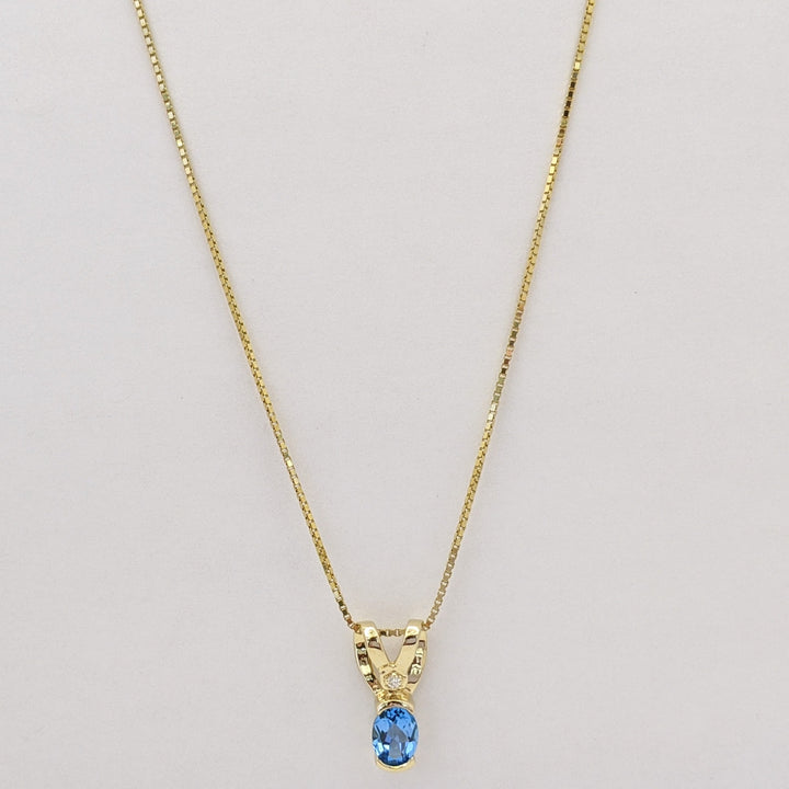 14K BLUE TOPAZ OVAL 6X8 HALF-BEZEL WITH MELEE ESTATE PENDANT & CHAIN 5.1 GRAMS