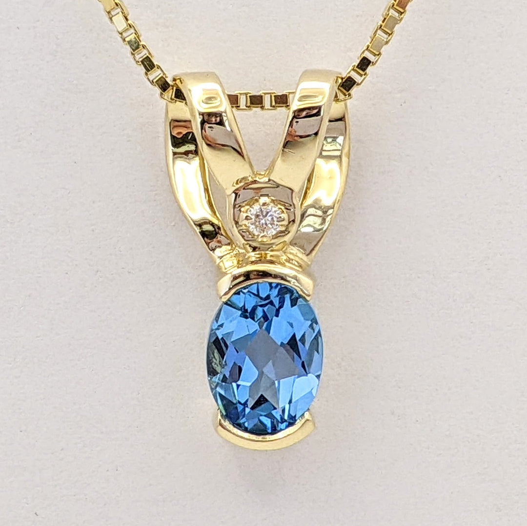 14K BLUE TOPAZ OVAL 6X8 HALF-BEZEL WITH MELEE ESTATE PENDANT & CHAIN 5.1 GRAMS