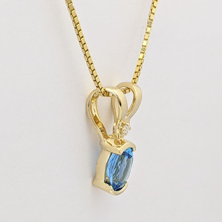 14K BLUE TOPAZ OVAL 6X8 HALF-BEZEL WITH MELEE ESTATE PENDANT & CHAIN 5.1 GRAMS