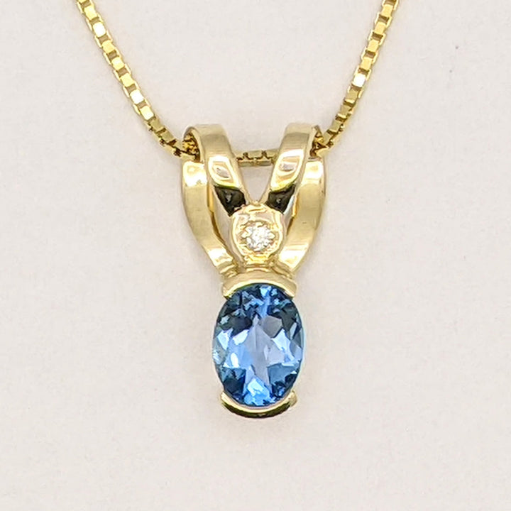 14K BLUE TOPAZ OVAL 6X8 HALF-BEZEL WITH MELEE ESTATE PENDANT & CHAIN 5.1 GRAMS