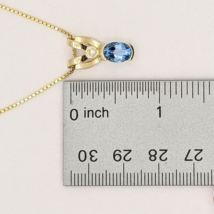 14K BLUE TOPAZ OVAL 6X8 HALF-BEZEL WITH MELEE ESTATE PENDANT & CHAIN 5.1 GRAMS