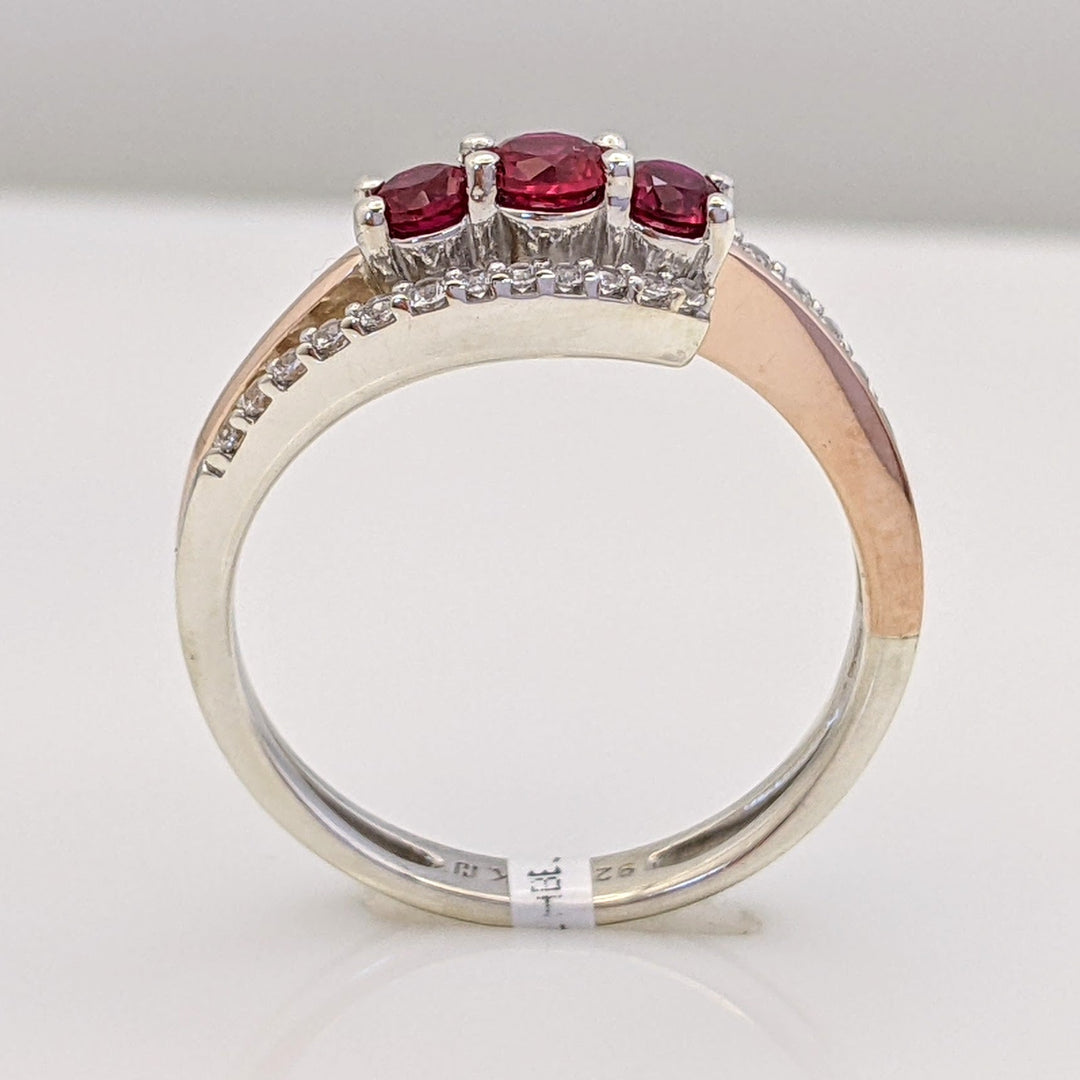 STERLING SILVER/ 10K ROSE GOLD LAB-CREATED RUBY ROUND (3) WITH .12 DIAMOND TOTAL WEIGHT BYPASS ESTATE RING 2.9 GRAMS