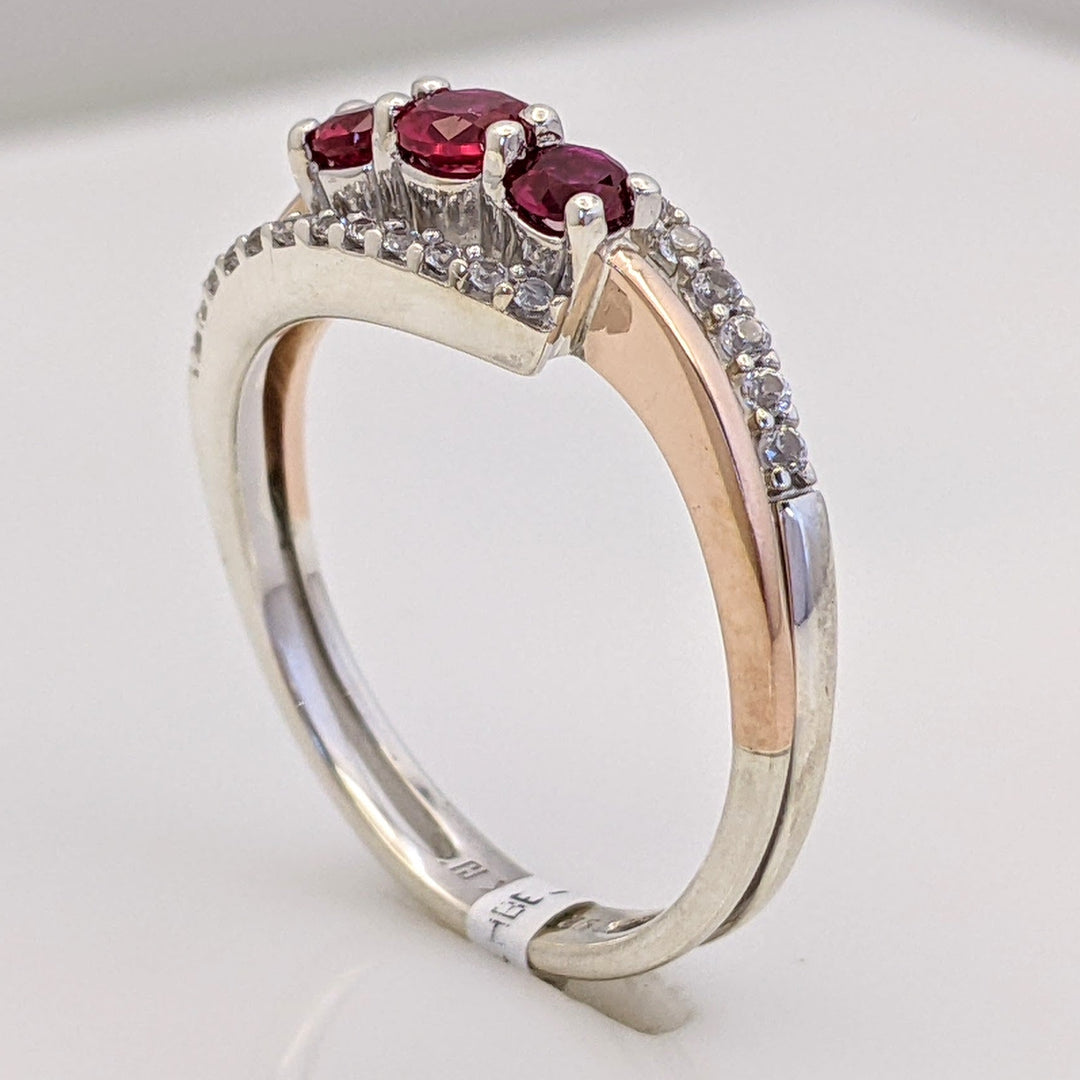 STERLING SILVER/ 10K ROSE GOLD LAB-CREATED RUBY ROUND (3) WITH .12 DIAMOND TOTAL WEIGHT BYPASS ESTATE RING 2.9 GRAMS
