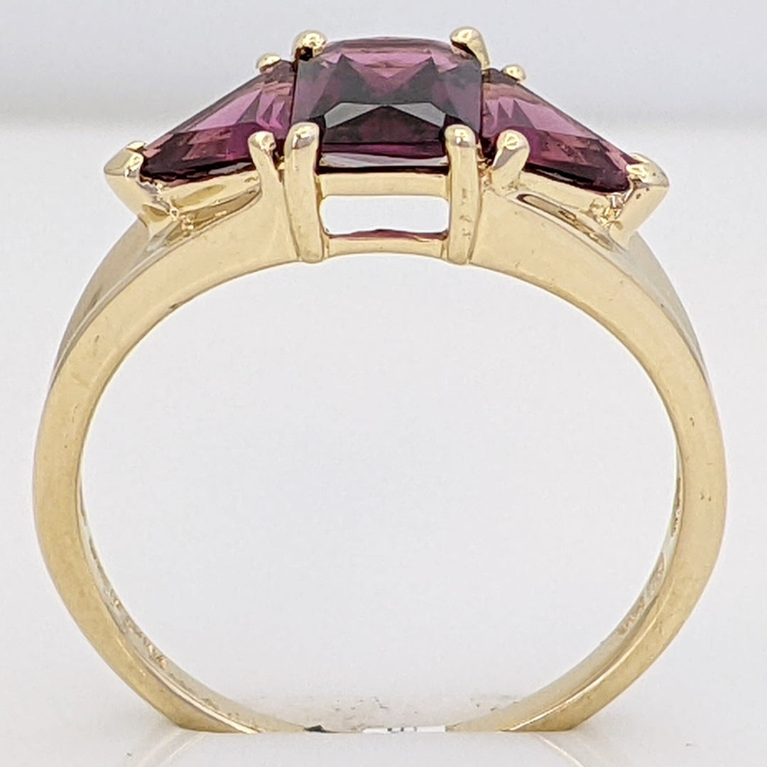 14K RHODOLITE GARNET EMERALD CUT 5X7 WITH (2) TRILLION ESTATE RING 2.6 GRAMS