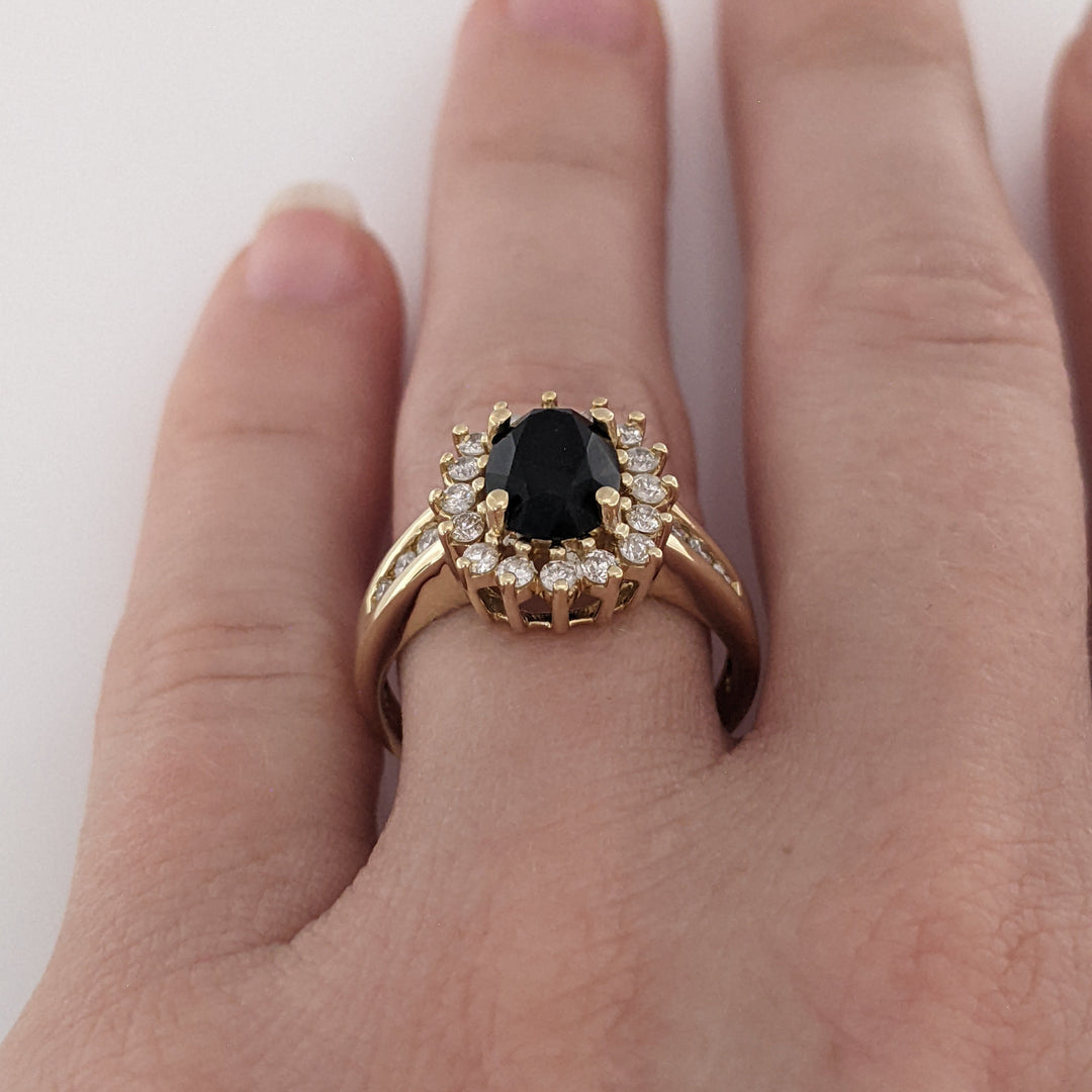 14K ONYX OVAL 6X8 WITH .50 DIAMOND TOTAL WEIGHT ESTATE HALO RING 3.7 GRAMS
