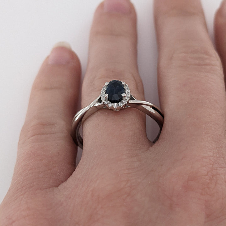 14K WHITE SAPPHIRE OVAL 4X6 WITH .15 DIAMOND TOTAL WEIGHT ESTATE HALO RING 2.7 GRAMS