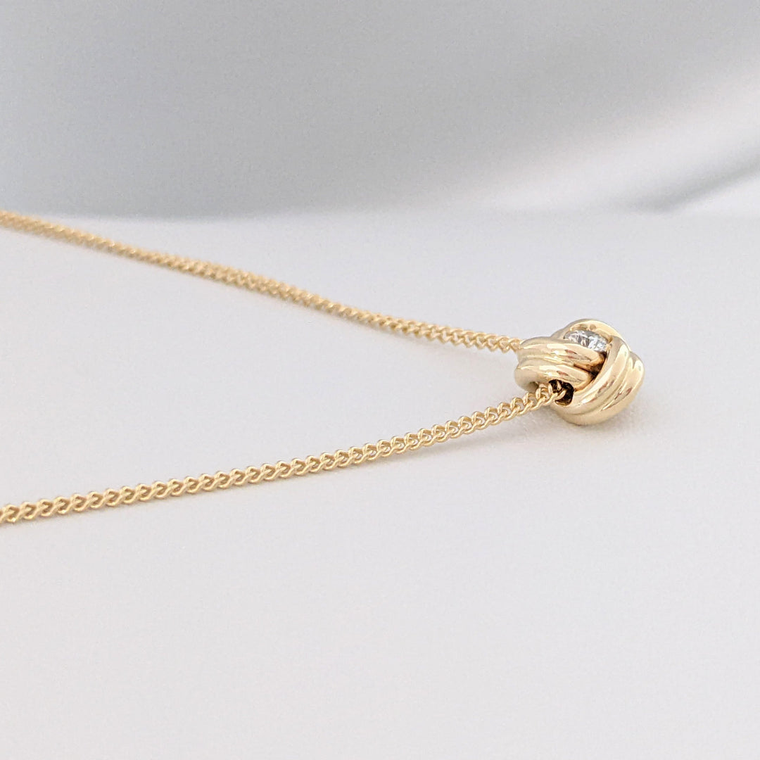 14K .15 CARAT TOTAL DIAMOND ROUND LOVE KNOT ESTATE PENDANT & CHAIN 3.9 GRAMS