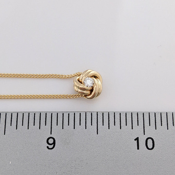 14K .15 CARAT TOTAL DIAMOND ROUND LOVE KNOT ESTATE PENDANT & CHAIN 3.9 GRAMS