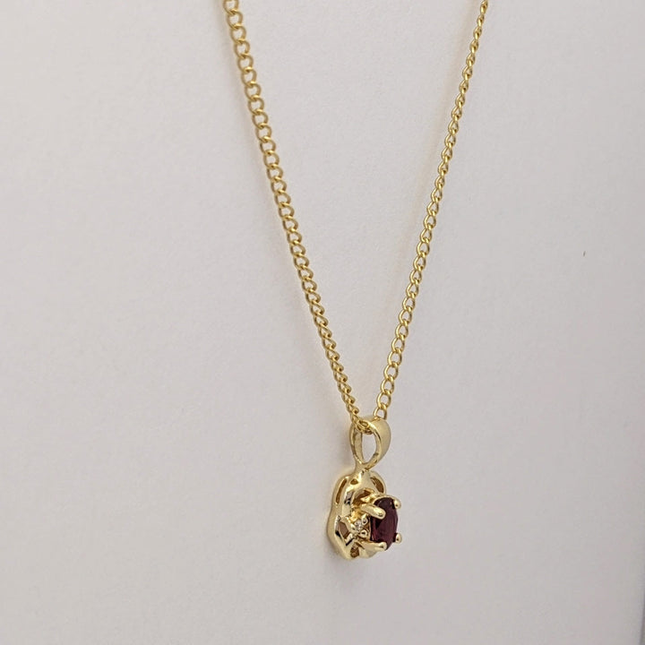 14K RUBY OVAL 3X5 WITH (2) MELEE ESTATE PENDANT & CHAIN 2.6 GRAMS