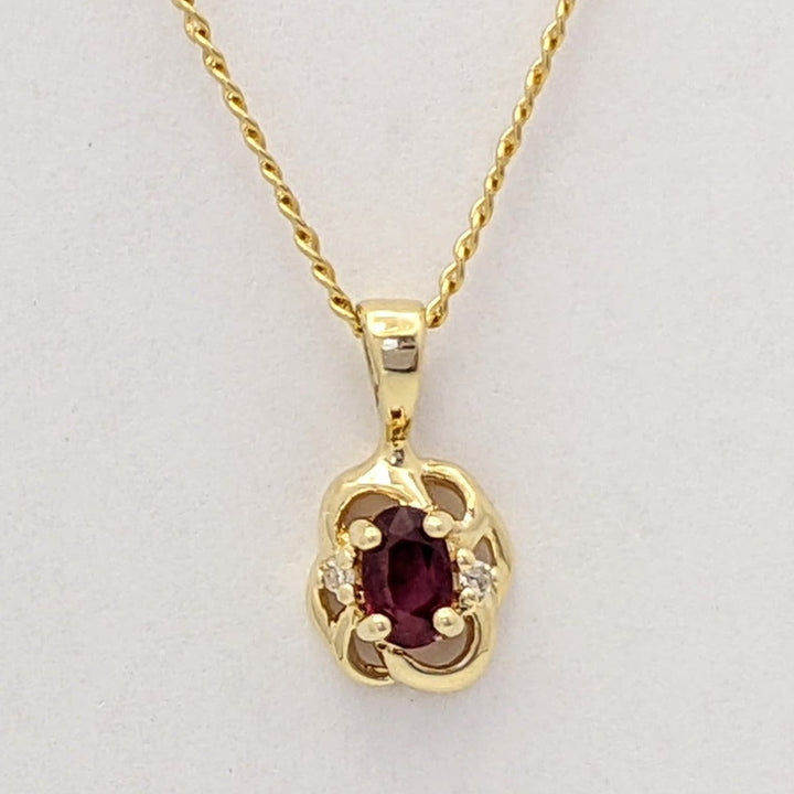 14K RUBY OVAL 3X5 WITH (2) MELEE ESTATE PENDANT & CHAIN 2.6 GRAMS