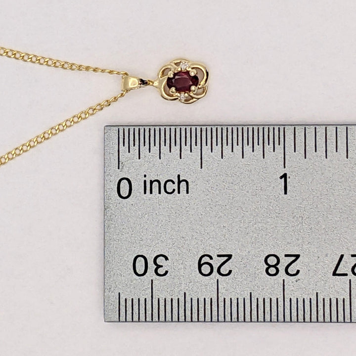 14K RUBY OVAL 3X5 WITH (2) MELEE ESTATE PENDANT & CHAIN 2.6 GRAMS