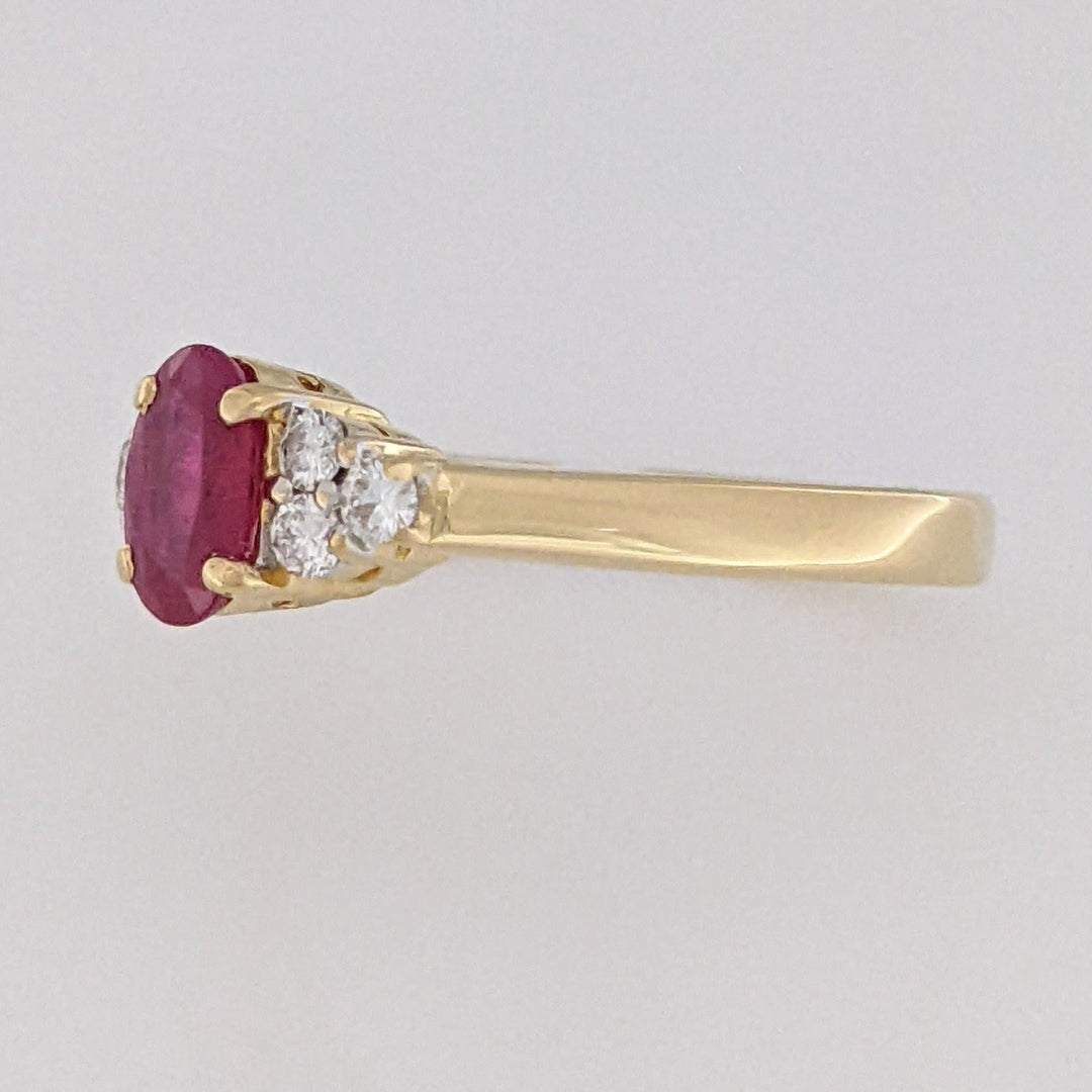 18K RUBY OVAL 4.9X6.6 OVAL WITH .18 DIAMOND TOTAL WEIGHT (6) ROUND ESTATE RING 3.4 GRAMS