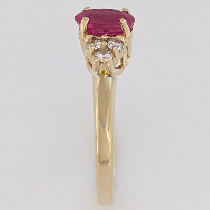 14K RUBY OVAL "A" 5X7 WITH .18 DIAMOND TOTAL WEIGHT (6) ROUND ESTATE RING 3.4 GRAMS